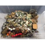 A BOX CONTAINING A QUANTITY OF COSTUME JEWELLERY TO INCLUDE BEADS, BANGLES, NECKLACES, BRACELETS,