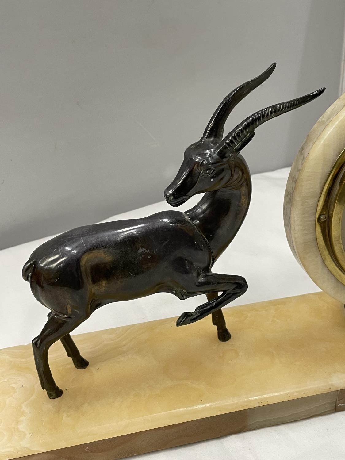 A MARBLE CIRCULAR CLOCK ON A MARBLE BASE WITH A METAL GAZELLE DECORATION BASE 40CM X 10CM - Image 3 of 4