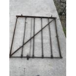 A PEDESTRIAN CAST IRON GARDEN GATE