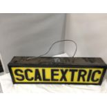 A SCALEXTRIC ILLUMINATED LIGHT BOX SIGN 62CM X 18CM X 10CM
