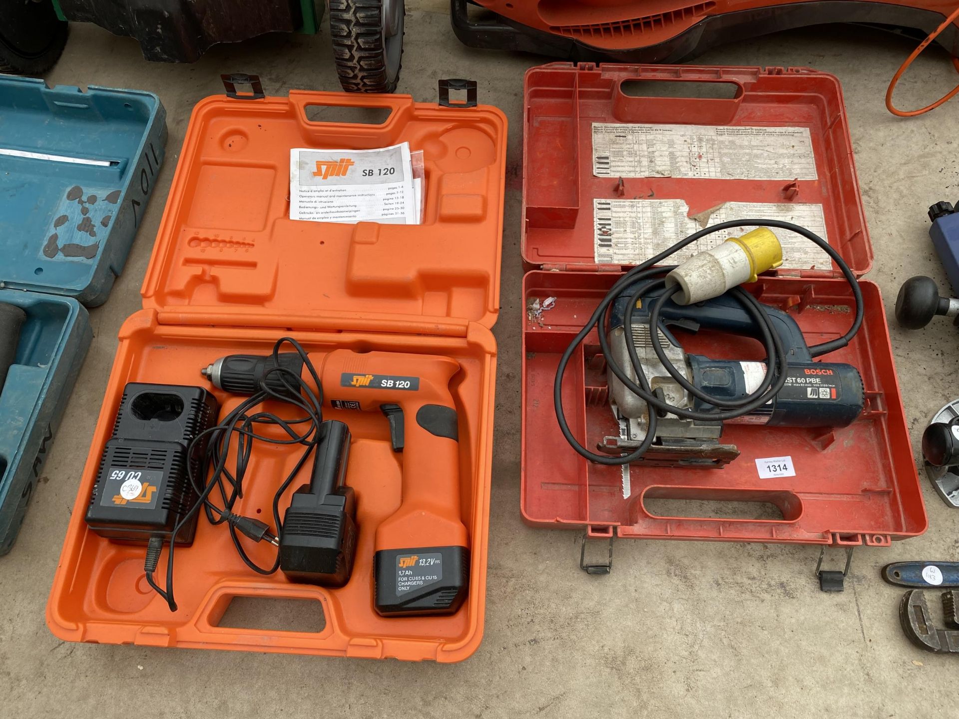 A BOSCH 110V JIGSAW AND A SPIT BATTERY POWERED DRILL