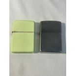 TWO ZIPPO LIGHTERS TO INCLUDE A FLORESCENT GREEN