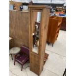 A NARROW NEXT MIRRORED STORAGE UNIT, 14" WIDE