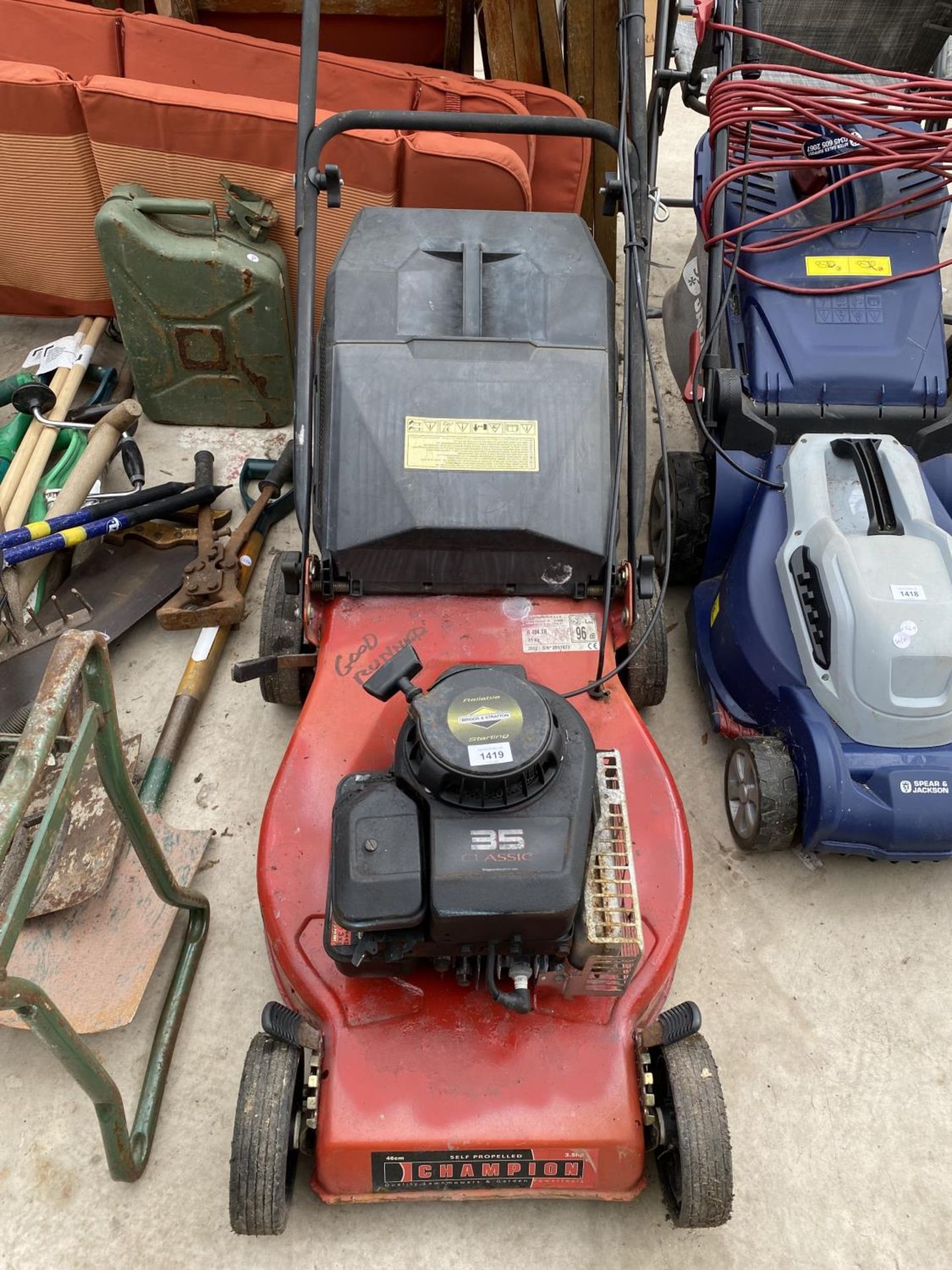 A CHALLANGE PETROL LAWN MOWER WITH GRASS BOX