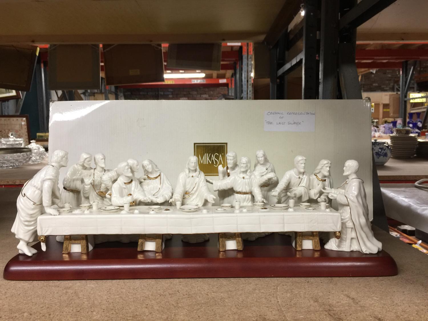 A CERAMIC REPRESENTATION OF JESUS CHRIST WITH HIS DISCIPLES AT THE LAST SUPPER BY MIKASA