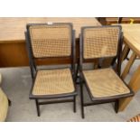 A PAIR OF FOLDING CHAIRS