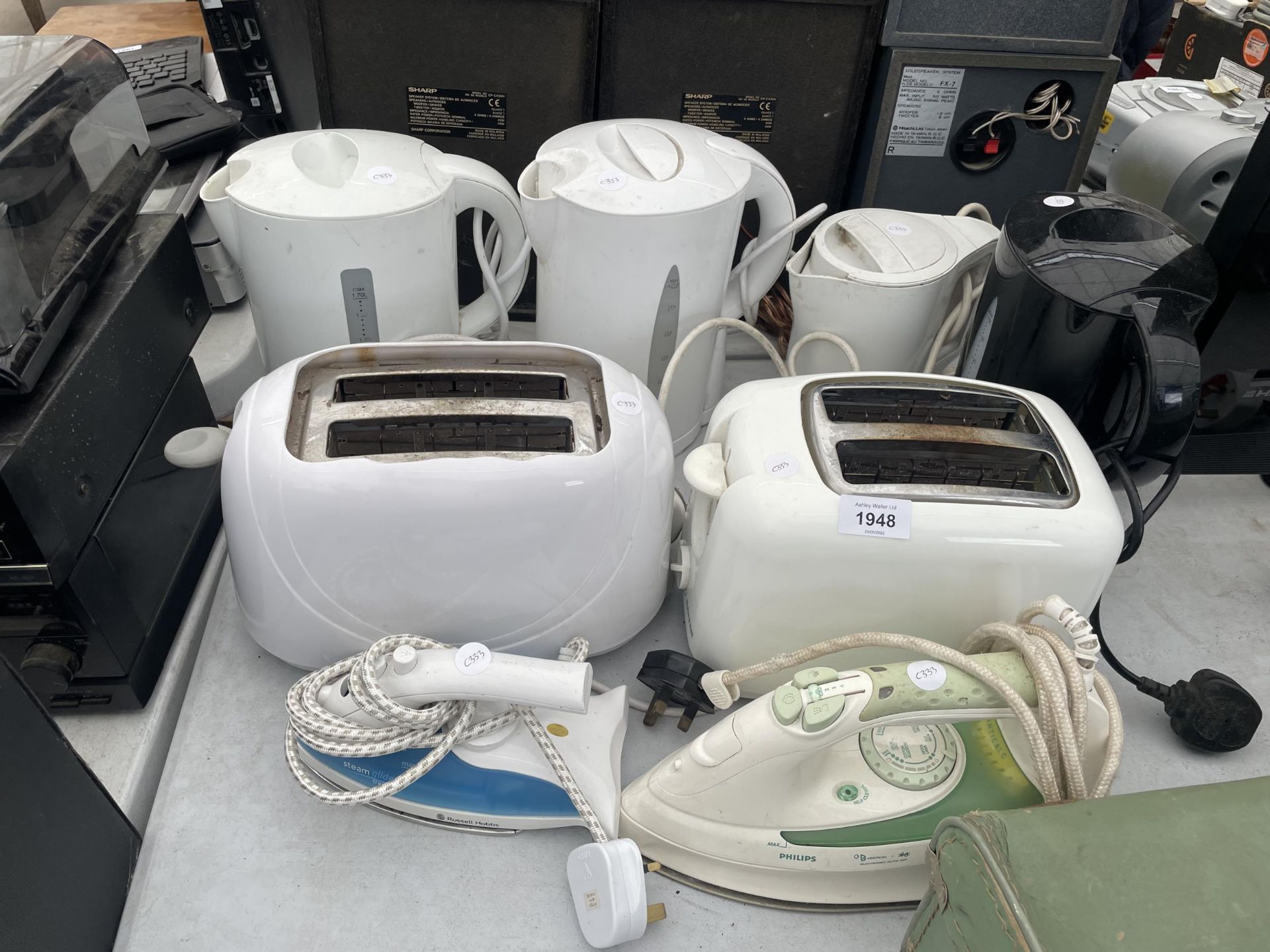 AN ASSORTMENT OF KETTLES, TOASTERS AND IRONS