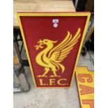 A WOODEN BRIGHTLY PAINTED 'L.F.C' SIGN