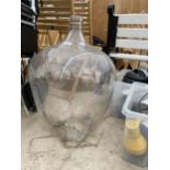 A LARGE CLEAR GLASS CARBOUY