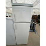 A WHITE MIELE UPRIGHT FRIDGE FREEZER