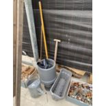 AN ASSORTMENT OF GARDEN ITEMS TO INCLUDE A GALVANISED WATERING CAN, A SPADE AND PLANTERS ETC