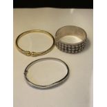 THREE MARKED SILVER BANGLES TO INCLUDE A SILVER GILT EXAMPLE