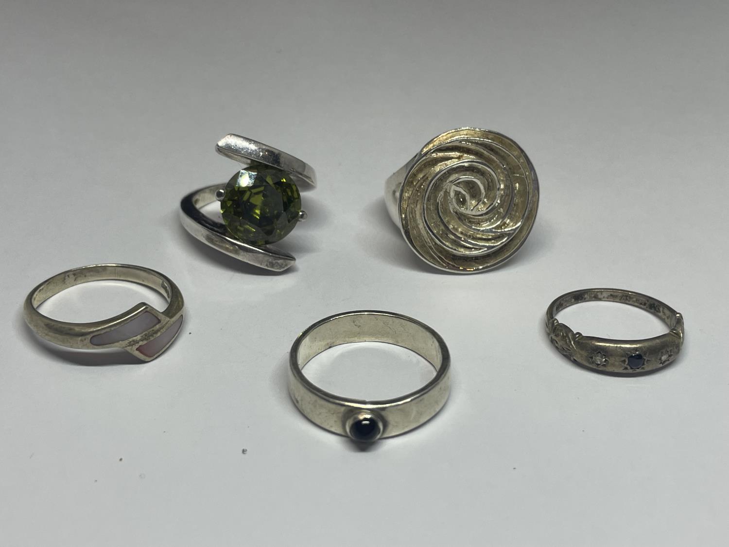 FIVE VARIOUS MARKED SILVER RINGS