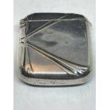 A WHITE METAL VESTA CASE