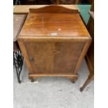 A MID 20TH CENTURY WALNUT BEDSIDE LOCKER