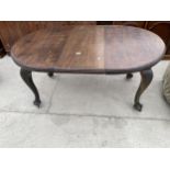 AN EDWARDIAN WIND-OUT TABLE ON CABRIOLE LEGS