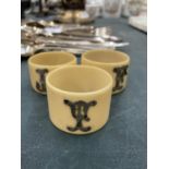 THREE BONE NAPKIN RINGS WITH HALLMARKED LONDON SILVER INITIALS