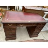 A REPRODUCTION MAHOGANY TWIN-PEDESTAL DESK WITH INSET LEATHER TOP, 48X24"