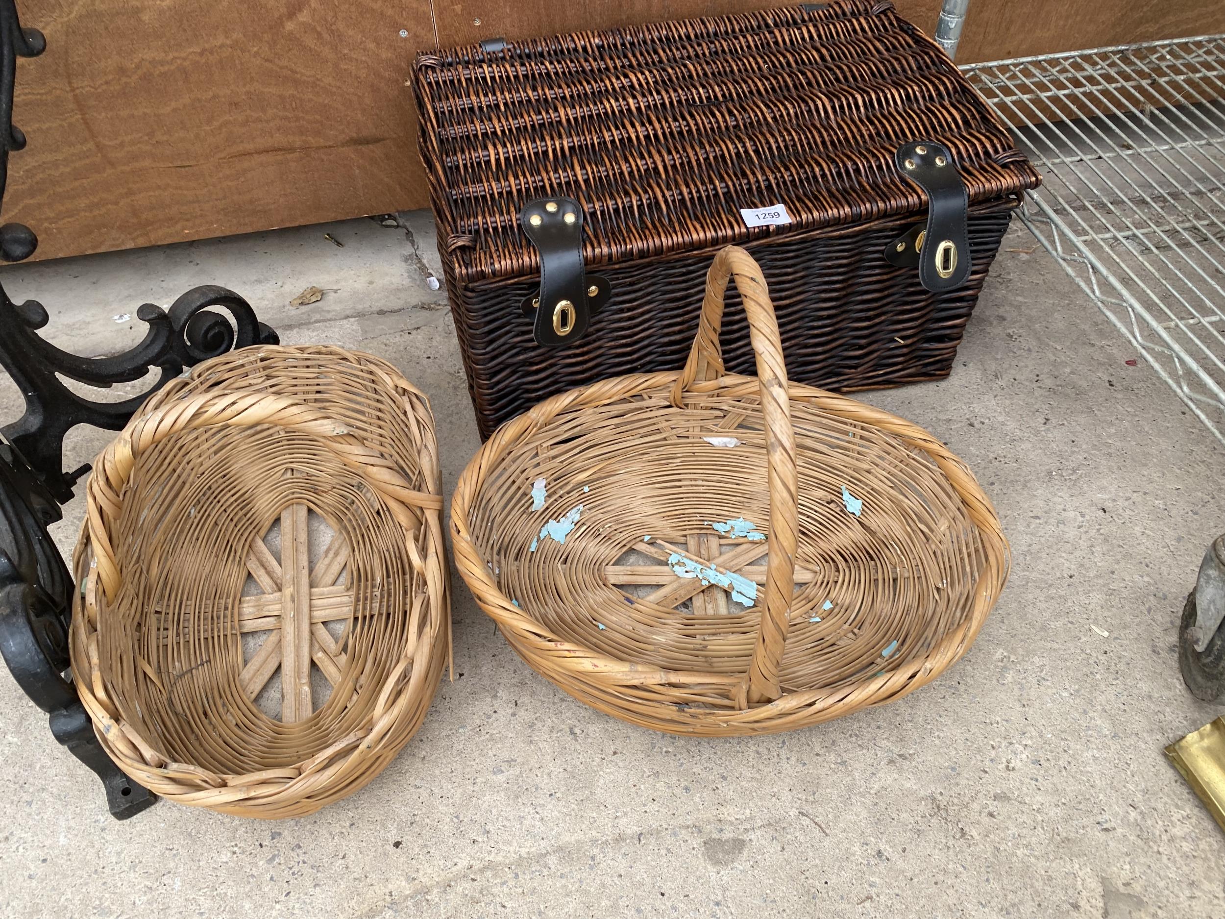 A WICKER PICNIC HAMPER AND TWO FURTHER WICKER BASKETS