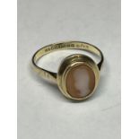 A 9 CARAT GOLD RING WITH A CAMEO SIZE M