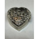 A HEART SHAPED HALLMARKED BIRMINGHAM SILVER PILL BOX WITH ORNATE TOP (HINGE A/F)