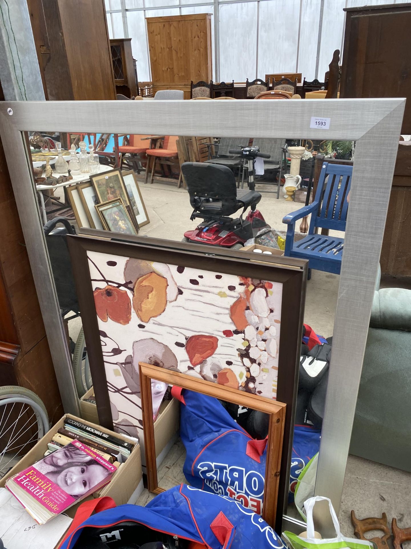 AN ASSORTMENT OF FRAMED PRINTS AND MIRRORS