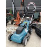A MAKITA ELECTRIC LAWN MOWER WITH GRASS BOX