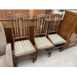 THREE EARLY 20TH CENTURY OAK BARLEYTWIST DINING CHAIRS