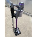 A HOME STICK VACUUM CLEANER WITH STAND AND CHARGER