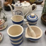 THREE PIECES OF BLUE AND WHITE T. G. GREEN STONEWARE, A PESTLE AND MORTAR AND TWO TEAPOTS