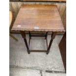 AN EARLY 20TH CENTURY OAK BARLEYTWIST CENTRE TABLE