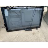 A 42" PANASONIC TELEVISION WITH REMOTE CONTROL