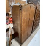 A MAHOGANY TWO DOOR NORMAN OF LONDON WARDROBE