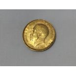 A GOLD SOVEREIGN DATED 1915