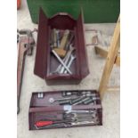 A METAL TOOL BOX AND AN ASSORTMENT OF TOOLS TO INCLUDE SOCKETS AND SPANNERS