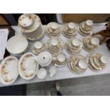 A LARGE QUANTITY OF WEDGWOOD 'TRELLIS FLOWER' CHINA DINNERWARE TO INCLUDE - 10 CUPS, 11 SAUCERS,