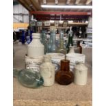 A COLLECTION OF VINTAGE BOTTLES TO INCLUDE ONES WITH MARBLE STOPPERS PLUS VINTAGE STONEWARE