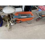 AN ASSORTMENT OF ITEMS TO INCLUDE A WHEEL BARROW, SHELVING AND A GARDEN FEATURE ETC