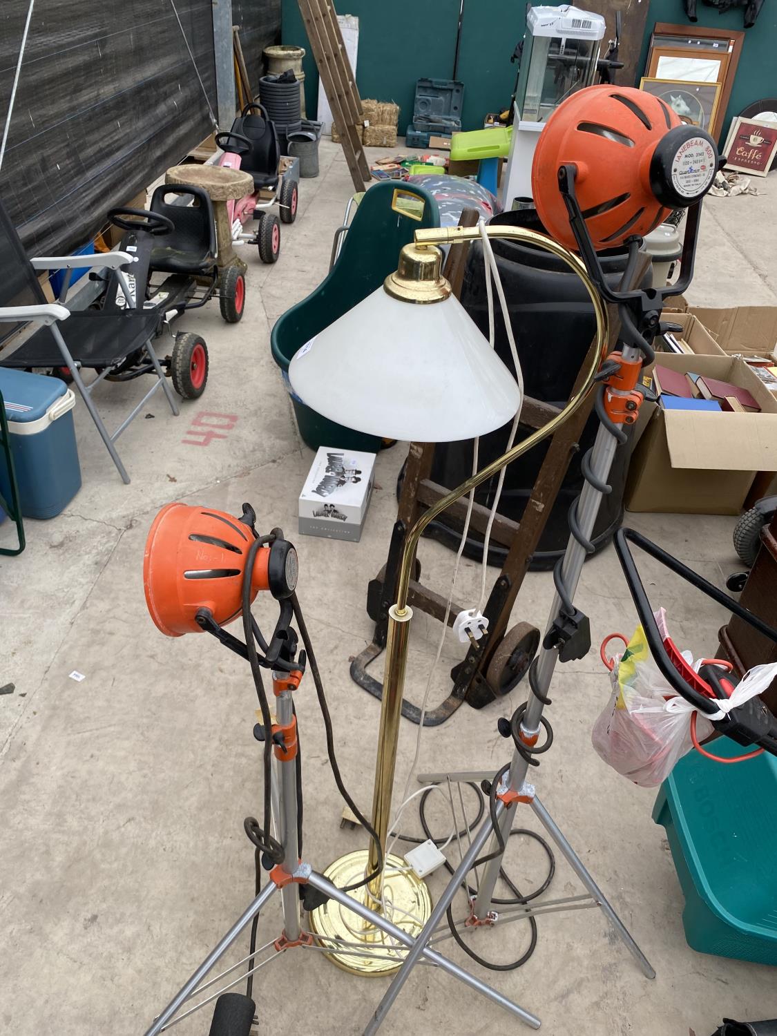 THREE VARIOUS LAMPS TO INCLUDE TWO TRIPOD WORK LIGHTS AND A STANDARD LAMP