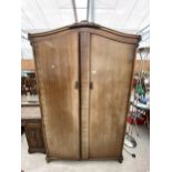 A MAHOGANY TWO DOOR NORMAN OF LONDON WARDROBE