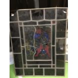 A PANE OF STAINED GLASS THE CENTRE BEING A KNIGHT IN ARMOUR A/F