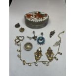 AN ENAMEL ORIENTAL DESIGN TOP WHITE METAL BOX WITH CONTENTS
