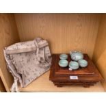 AN ORIENTAL STYLE WOODEN BOX WITH SLIDING LID A TEA SET WITH ORIENTAL MARKS TO BASE AND A BAG ETC