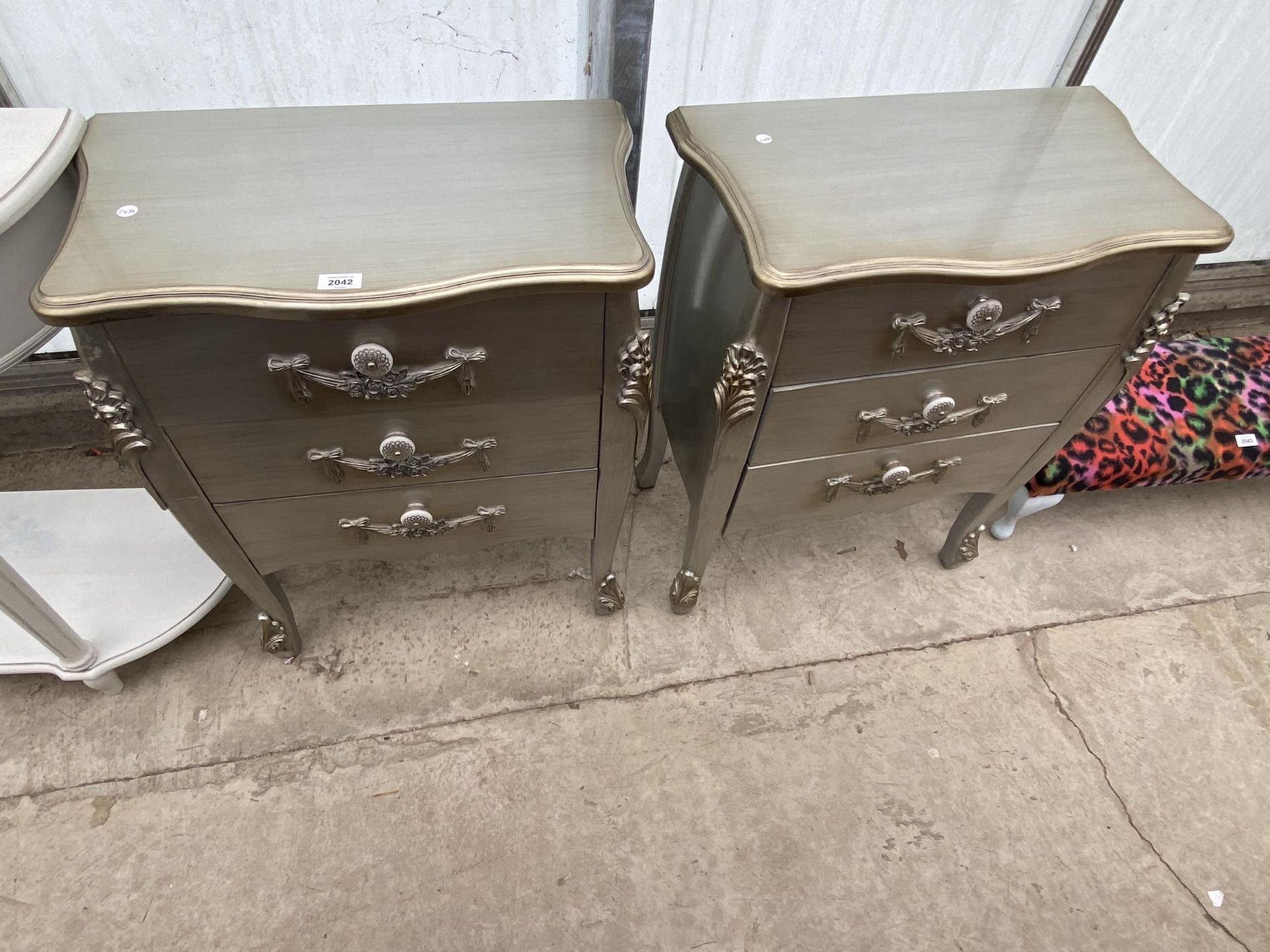 A PAIR OF MODERN SILVER PAINTED THREE DRAWER CHESTS, 24" WIDE EACH