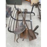 A VINTAGE METAL LOG STAND AND FIRE SIDE COMPANION ITEMS