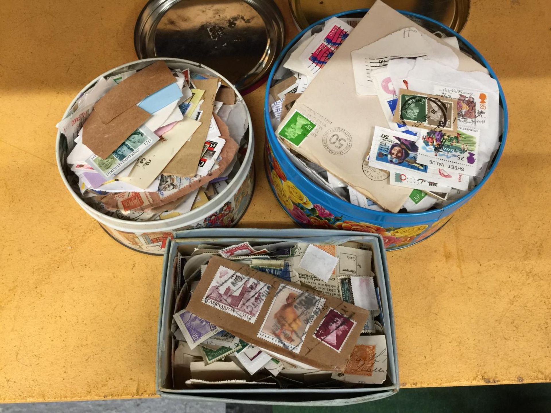 TWO TINS AND A BOX CONTAINING VARIOUS LOOSE STAMPS