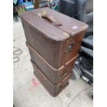 A VINTAGE WOODEN BOUND TRAVEL CASE