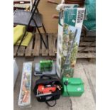 AN ASSORTMENT OF TOOLS TO INCLUDE A BLACK AND DECKER JIGSAW, A BATTERY CHARGER AND A HEDGE TRIMMER