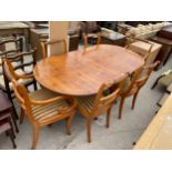 A REGENCY STYLE YEW WOOD PEDESTAL DINING TABLE AND SIX CHAIRS, TWO BEING CARVERS