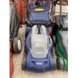 A SPEAR AND JACKSON ELECTRIC LAWN MOWER WITH GRASS BOX BELIEVED IN WORKING ORDER BUT NO WARRANTY